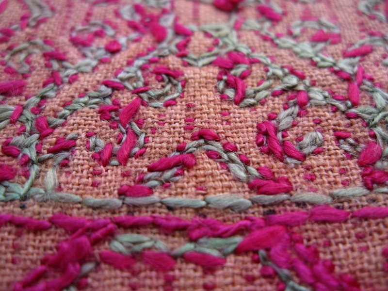A hand-embroidered pillow cover from Hazara, Pakistan