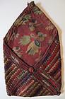 A small embroidered silk purse from Ghazni province
