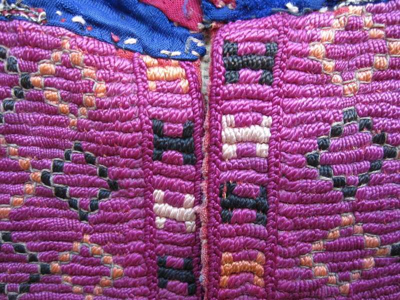 A child's embroidered dress front from Afghanistan