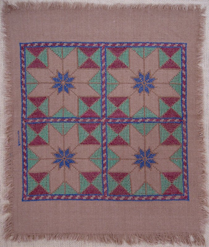 A Hazara embroidered cloth, 33x39 cm