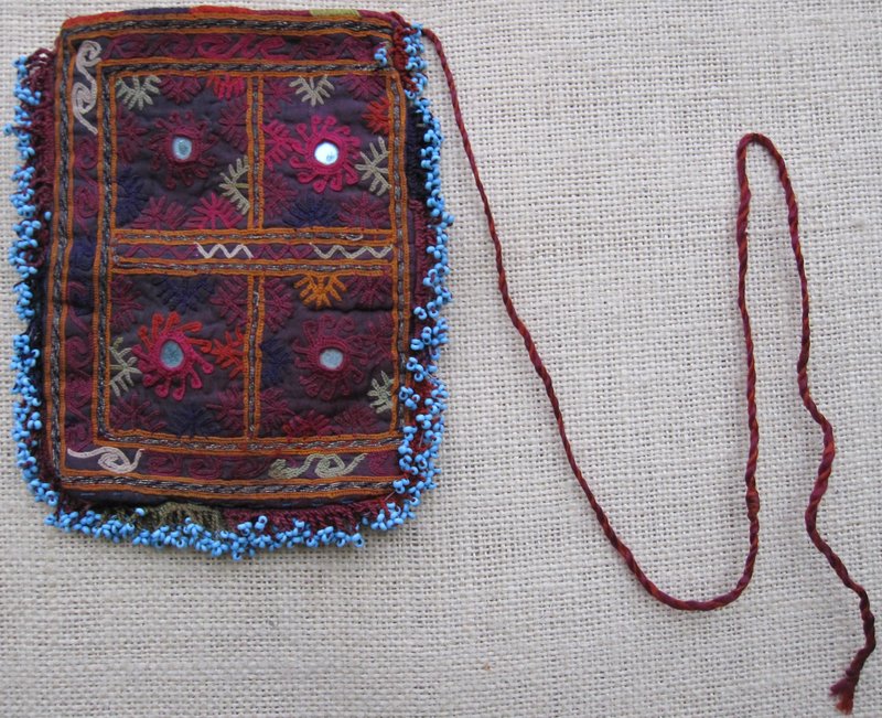A Pashtun nomad beaded purse, mid 20th century