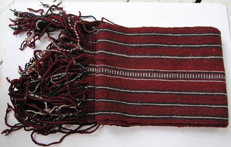 A vintage wool sash from Tibet with stripes