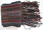 A striped woven wool sash from Tibet