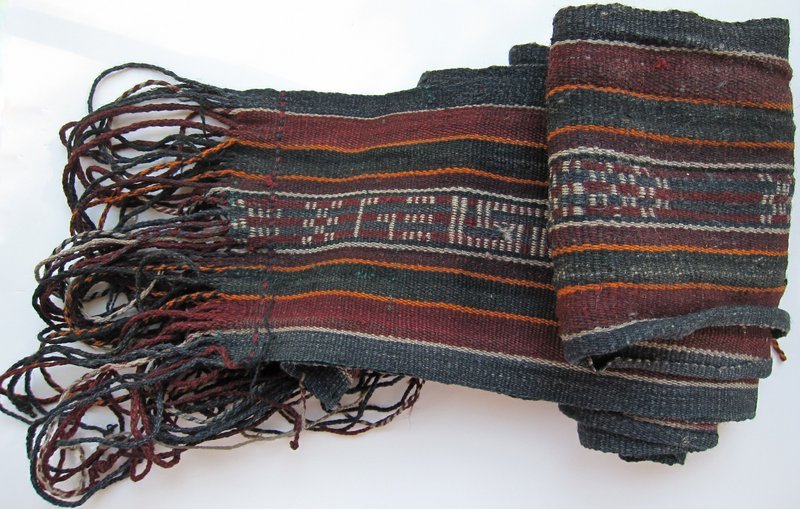 A striped woven wool sash from Tibet