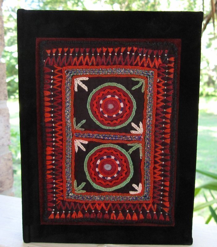 A handmade suede journal with Afghan embroidery
