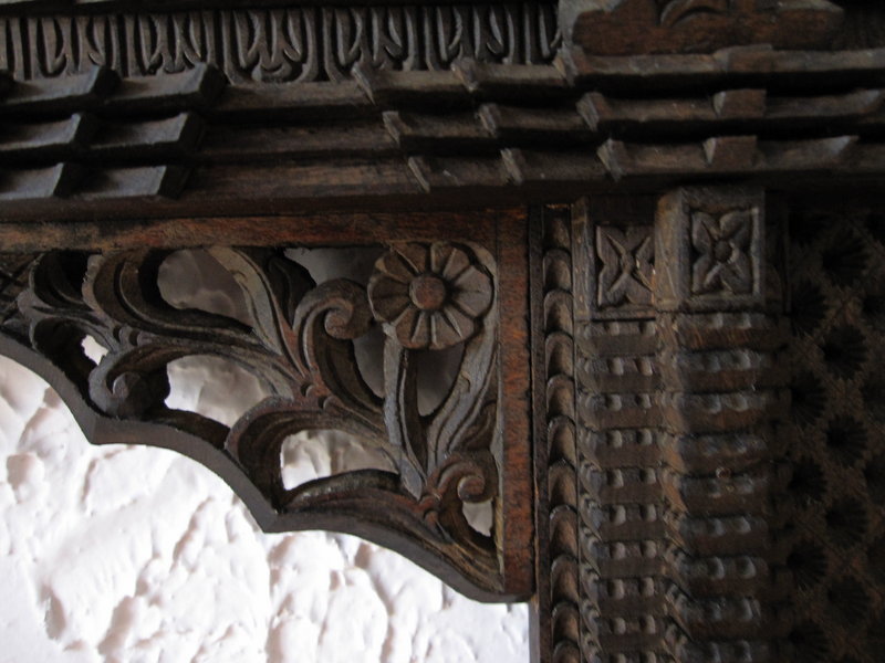 A pair of hand-carved window frames from Nepal