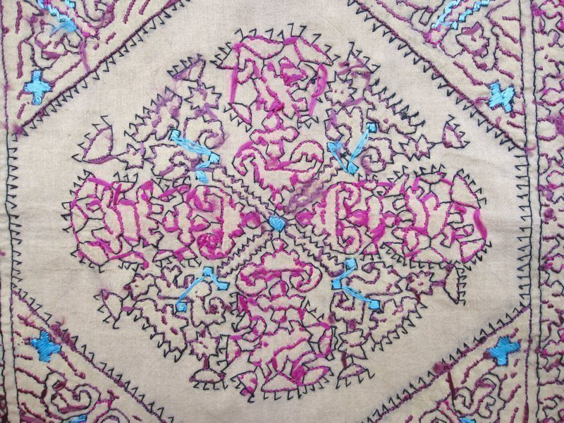 A silk-embroidered cushion cover from Hazara district