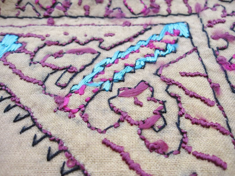 A silk-embroidered cushion cover from Hazara district