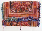 A vintage trifold wallet from Afghanistan w/ blue beads