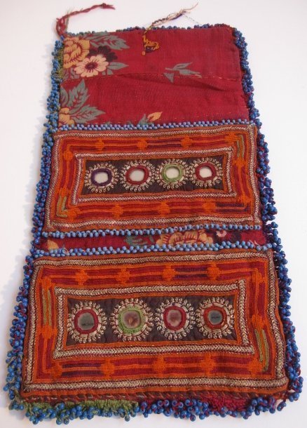 A vintage trifold wallet from Afghanistan w/ blue beads