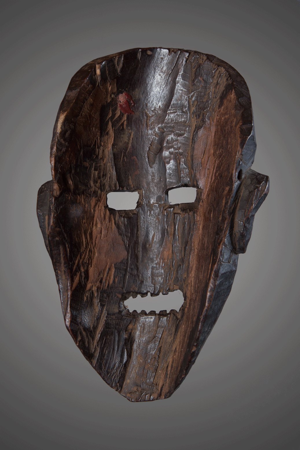 Primitive mask with black twisted face, , Nepal