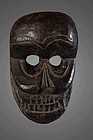 Black patina skull mask, India, Himalaya
