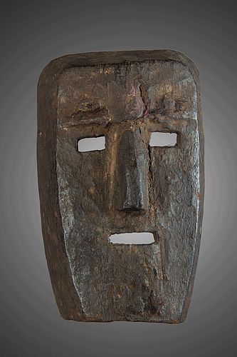 Primitive mask with dark brown encrusted patina, Himalayas, Népal