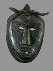 Black Primitive mask with hair,