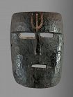 Flat black primitive mask with trisul, Himalaya, Nepal
