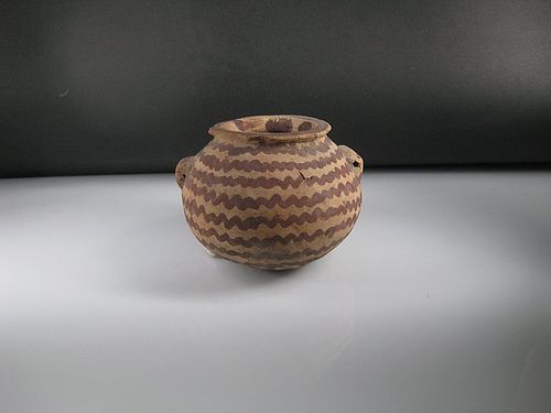 An Egyptian Pre-Dynastic terracotta jar, Naqada II Period, c. 3200 BC