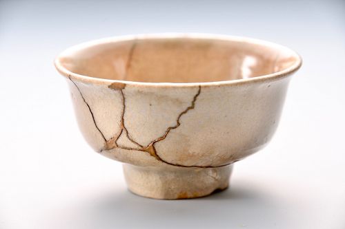 An Edo Period Seto Shuhai (Saké Cup) with Gold Repairs