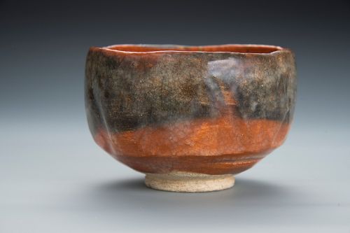 A Red Raku Tea Bowl with Gold Repairs by Ogawa Choraku II