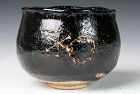 A Black Raku "December" Tea Bowl by Renowned Potter Ohi Chozaemon IX