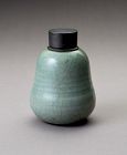 An Antique Celadon Tea Container with Pewter Cap
