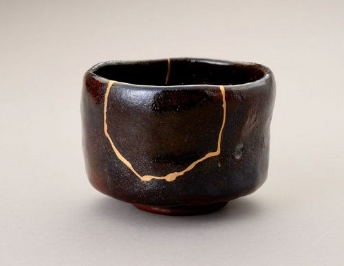 An Exceptional Antique Raku Tea Bowl with Gold Repair