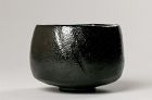 A Classic Black Raku Tea Bowl by Famed Potter Ōhi Chōzaemon X