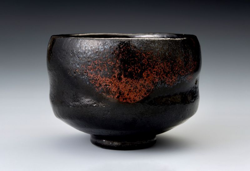 A Black Raku Tea Bowl by Heian Shoraku