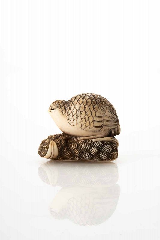 Ivory netsuke quail on a millet