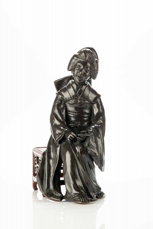 A Tokyo school bronze sculpture depicting a sitting geisha