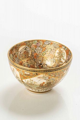 A Japanese Satsuma bowl decorated with polychrome enamels and gold