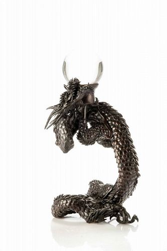 A Japanese bronze okimono depicting a Ryu dragon