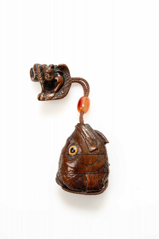 A Japanese wooden inro with two compartments depicting a carp