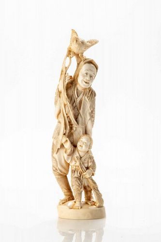 An ivory okimono depicting a hunter with rooster and child