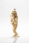 An ivory okimono depicting a fisherman with his child