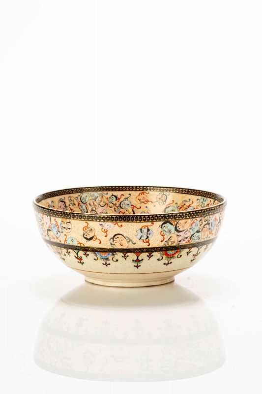 A Satsuma ceramic tea bowl, signed Senzan