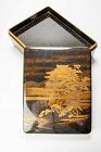 A black and gold lacquer ryoshibako document box