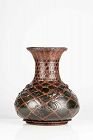 A rare bronze vase that simulates bamboo