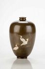 A Japanese bronze vase with three egrets