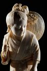 A Tokyo School ivory okimono depicting a young fisherman boy