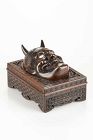 A box with a Hannya mask-shaped lid