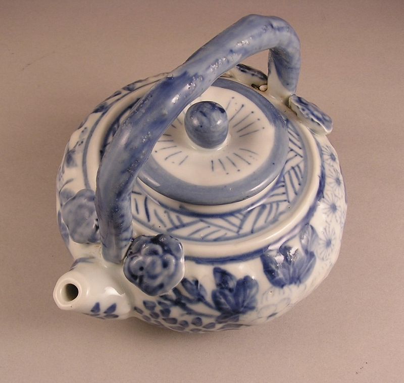 Unusual Japanese Porcelain Tea Pot with Flower Design