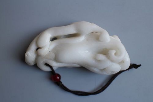 A white Jade Finger Citron with Mythical animal.