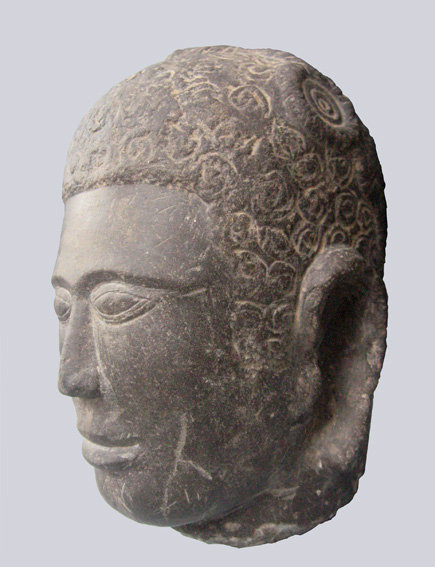 A rare Khmer black stone Buddha head, Pre-Angkor 4thC