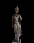 A Large Bronze Walking Buddha, Thailand 17th Century