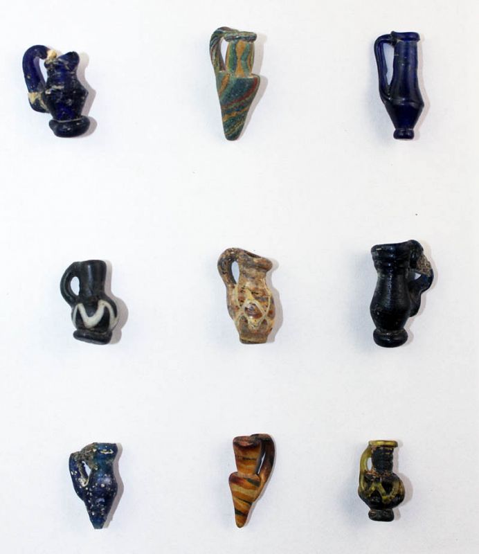 Rare collection of 9 Roman Rod formed glass vessels, 3rd. century AD!