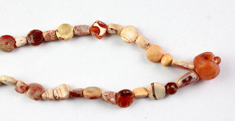 Calcified Carnelian stone necklace, Asian Near East ca. 2nd. mill. BC