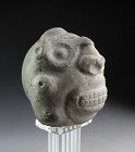 A superb pre-columbian stone head of the Taino Culture, 1000-1300 AD.