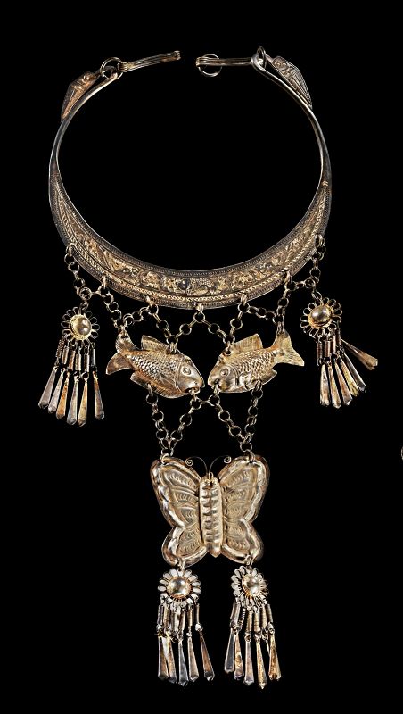 A large silver necklace, Hmong (Miao) culture