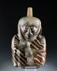 High quality Pre-Columbian Moche Female Stirrup vessel, 3rd.-5th. c.
