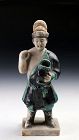 An interesting Ming Dynasty Pottery Figure of a Houseworker, 1368-1644